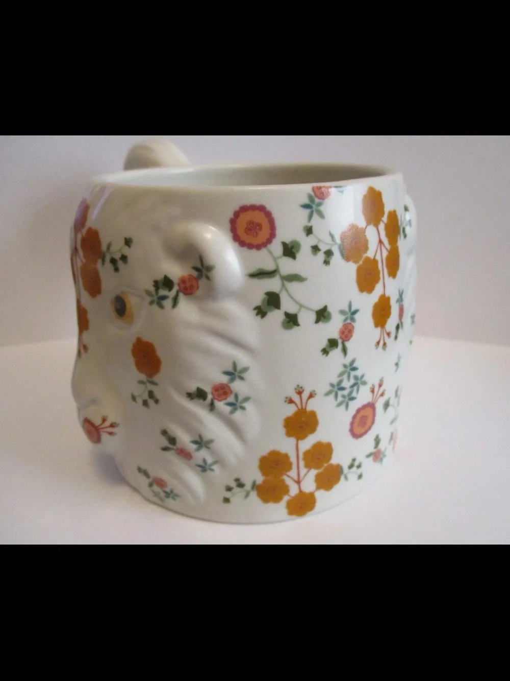 Anthropologie “Marisol Lion”  Motif and Green Leaves